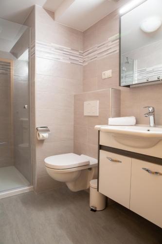 Ένα μπάνιο στο Apartments Korošec