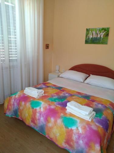Ένα ή περισσότερα κρεβάτια σε δωμάτιο στο Guest House Mila