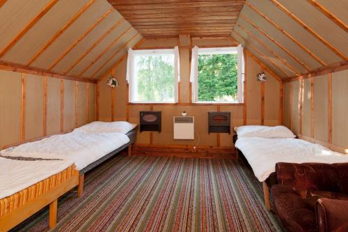 Cama ou camas em um quarto em Chalupa Otava