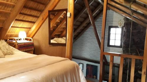 A bed or beds in a room at LA CABAÑA