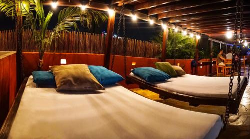Postel nebo postele na pokoji v ubytování La Brisa Loca Hostel