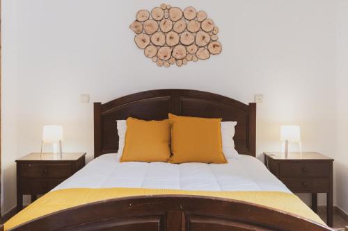 Кровать или кровати в номере Casa de Pimenteis