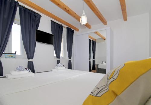Posteľ alebo postele v izbe v ubytovaní Villa Sea star