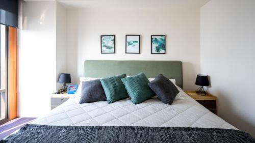 Voodi või voodid majutusasutuse Miyana Luxury Condo toas