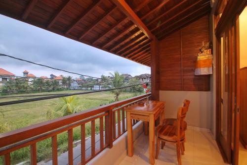 Балкон или терраса в Sari Bungalow