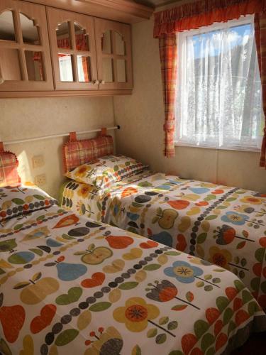 Giường trong phòng chung tại Lyndhurst 39