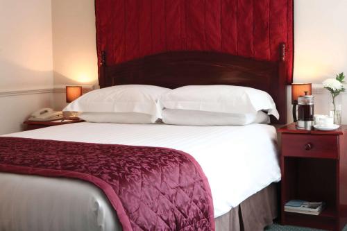 Ein Bett oder Betten in einem Zimmer der Unterkunft Quy Mill Hotel & Spa, Cambridge