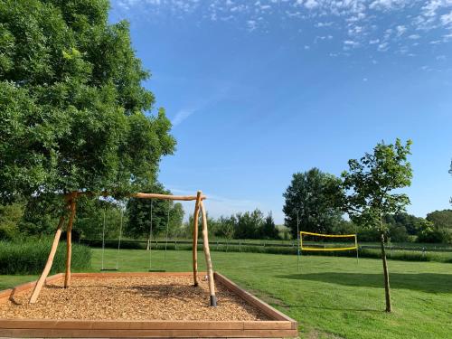 a playground with a goal in a park at Appartementanlage Lancken-Granitz in Lancken-Granitz