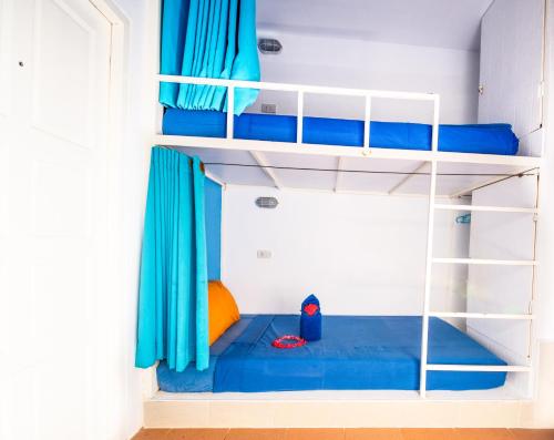 Ein Etagenbett oder Etagenbetten in einem Zimmer der Unterkunft Shiralea Island Resort