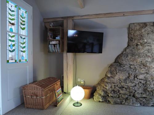 TV a/nebo společenská místnost v ubytování Drevenica Inga