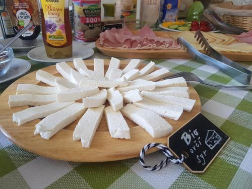 a bunch of uncooked food on a cutting board at BIO Farma & Penzión Zlatý Hýľ in Nováčany