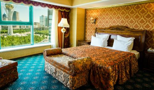 מיטה או מיטות בחדר ב-Diplomat Hotel by AG Hotels Group