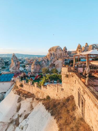 a view from the top of a castle with rocks in the background at Panoramic Cave Hotel in Goreme