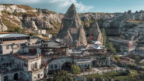 an aerial view of a town on a mountain at Panoramic Cave Hotel in Goreme