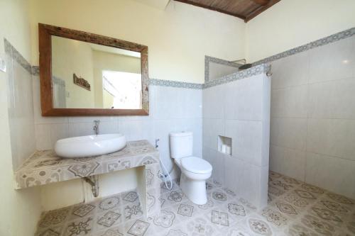 Un baño de Mango Villa