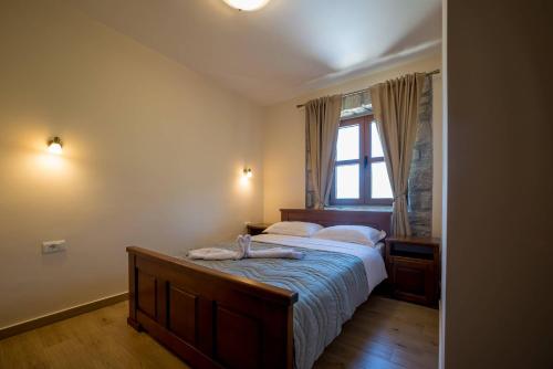 Ένα ή περισσότερα κρεβάτια σε δωμάτιο στο Villa Old Castle Apartments