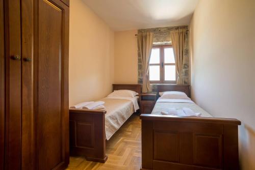 Ένα ή περισσότερα κρεβάτια σε δωμάτιο στο Villa Old Castle Apartments