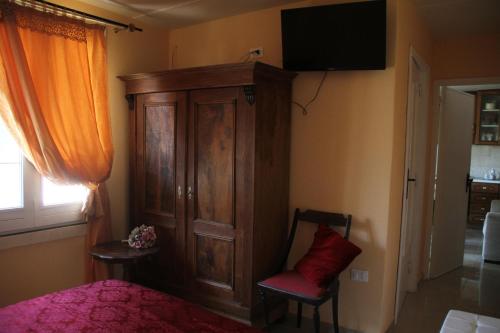 TV a/nebo společenská místnost v ubytování B&B Scipponate
