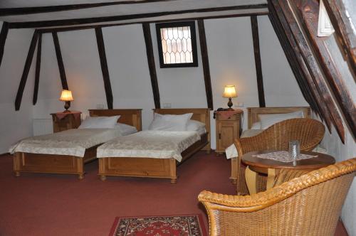 Cama o camas de una habitación en Hotel Cerny Slon