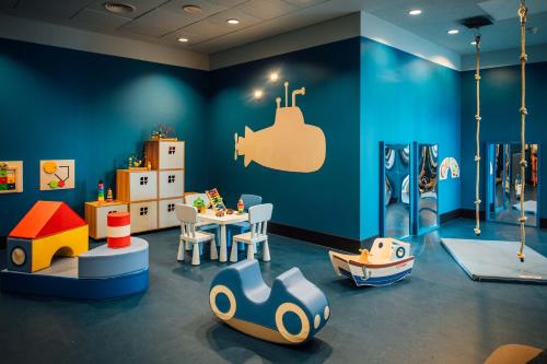 a room with many different types of play equipment at Vienna House by Wyndham Amber Baltic Miedzyzdroje in Międzyzdroje