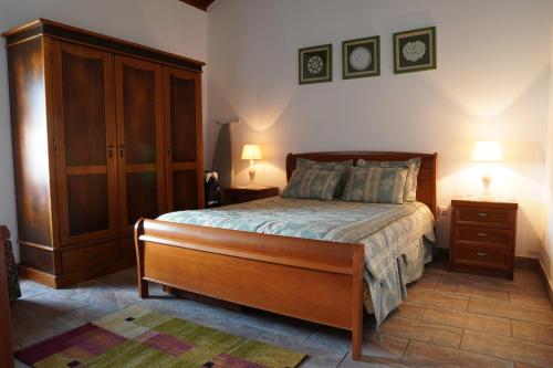 A bed or beds in a room at Casa do ti' Marrão