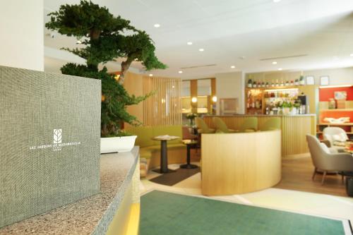 Гостиная зона в Jardins de Mademoiselle Hôtel & Spa