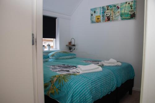 Ένα ή περισσότερα κρεβάτια σε δωμάτιο στο Appartementen Aangenaam - Olde Horst Diever