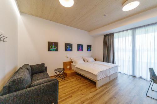 Postel nebo postele na pokoji v ubytování WUD hotel