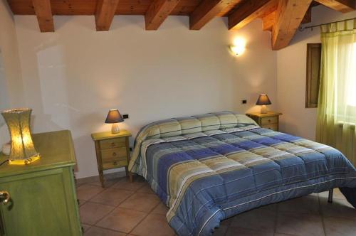 A bed or beds in a room at B&B Casa Ghiani