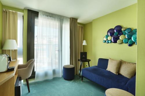 Гостиная зона в Jardins de Mademoiselle Hôtel & Spa