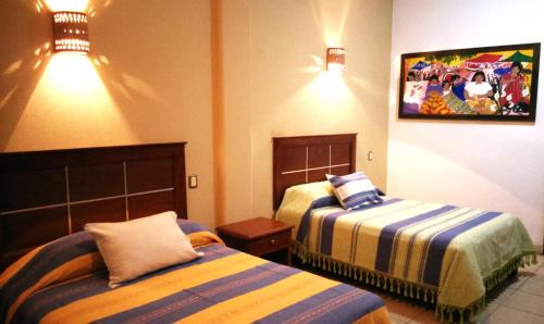 Cama o camas de una habitación en Paraje La Huerta