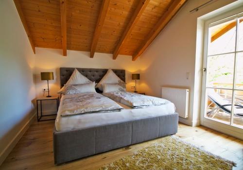 Giường trong phòng chung tại Bergliebe