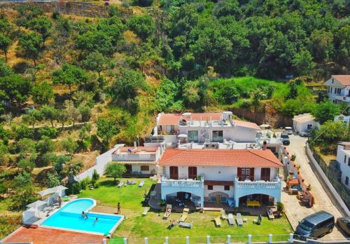 an aerial view of a large house with a swimming pool at Appartamenti Borgo Panoramico N 5 in Tropea