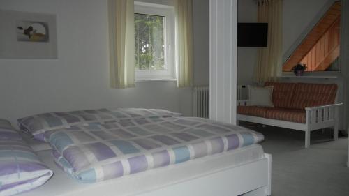 Postel nebo postele na pokoji v ubytování Hotel Barbara