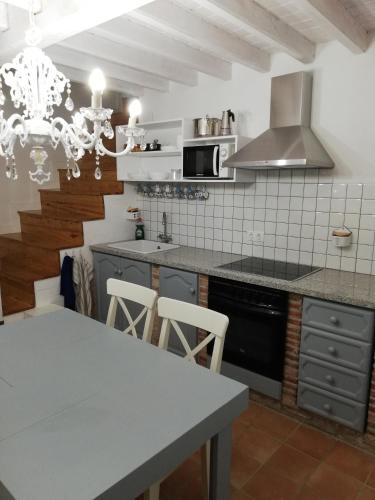 Una cocina o zona de cocina en Alojamiento San Juan Bautista