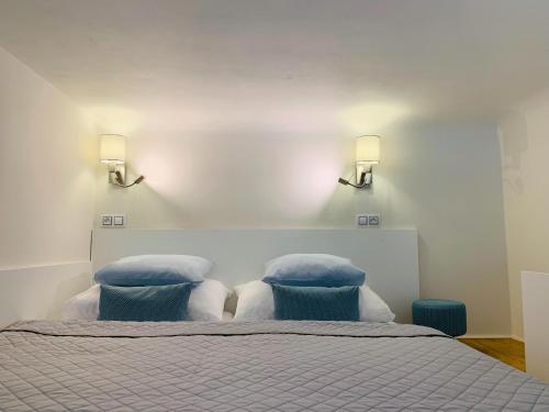 Ένα ή περισσότερα κρεβάτια σε δωμάτιο στο Marienbad Apartment
