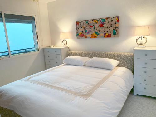 เตียงในห้องที่ Casa al Mar