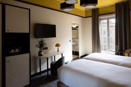 Postel nebo postele na pokoji v ubytování Best Western Premier Hotel Roosevelt