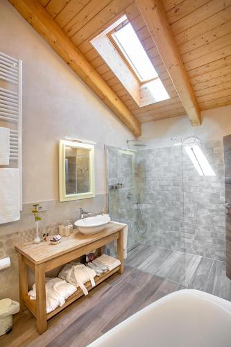 a bathroom with a sink and a shower at Agr. Cascina Fabbrica in Fossano