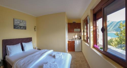 Cama o camas de una habitación en Villa & Apartments Perasto