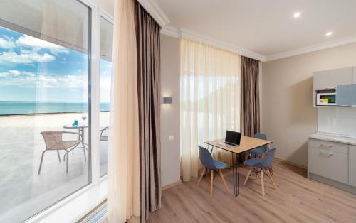 Η κουζίνα ή μικρή κουζίνα στο Green Apartments