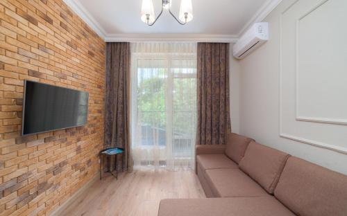 Μια τηλεόραση ή/και κέντρο ψυχαγωγίας στο Green Apartments