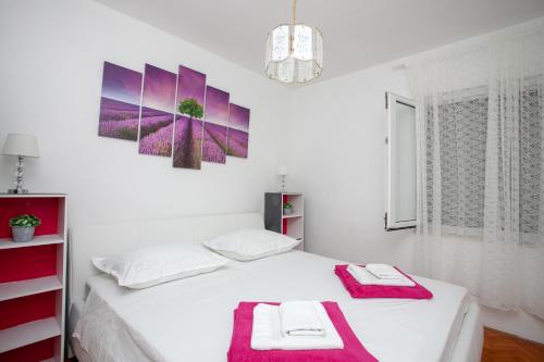 A bed or beds in a room at AP MARIJANA