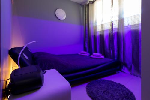 En eller flere senge i et værelse på BUTOROWY RESIDENCE Apartament "GÓRSKA ORCHIDEA"