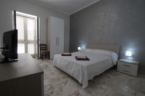 Una cama o camas en una habitación de Dimora Varchi