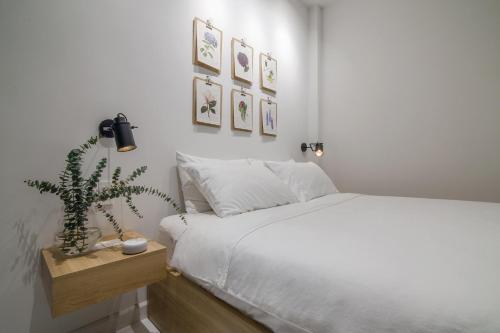 Postel nebo postele na pokoji v ubytování Botanist Lab Minihotel by CIRCADIAN