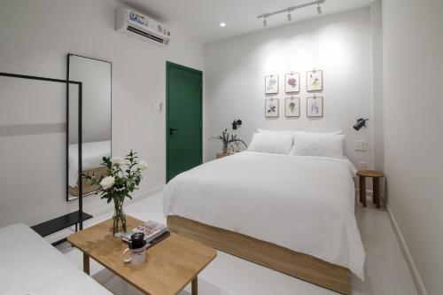 Postel nebo postele na pokoji v ubytování Botanist Lab Minihotel by CIRCADIAN