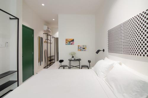 Postel nebo postele na pokoji v ubytování Botanist Lab Minihotel by CIRCADIAN