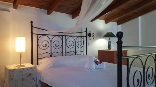 Postel nebo postele na pokoji v ubytování Villa Georgia Poseidi