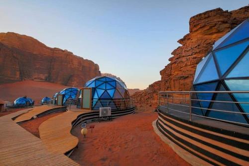 a rendering of a desert observatory in a canyon at Memories Aicha Luxury Camp in Wadi Rum